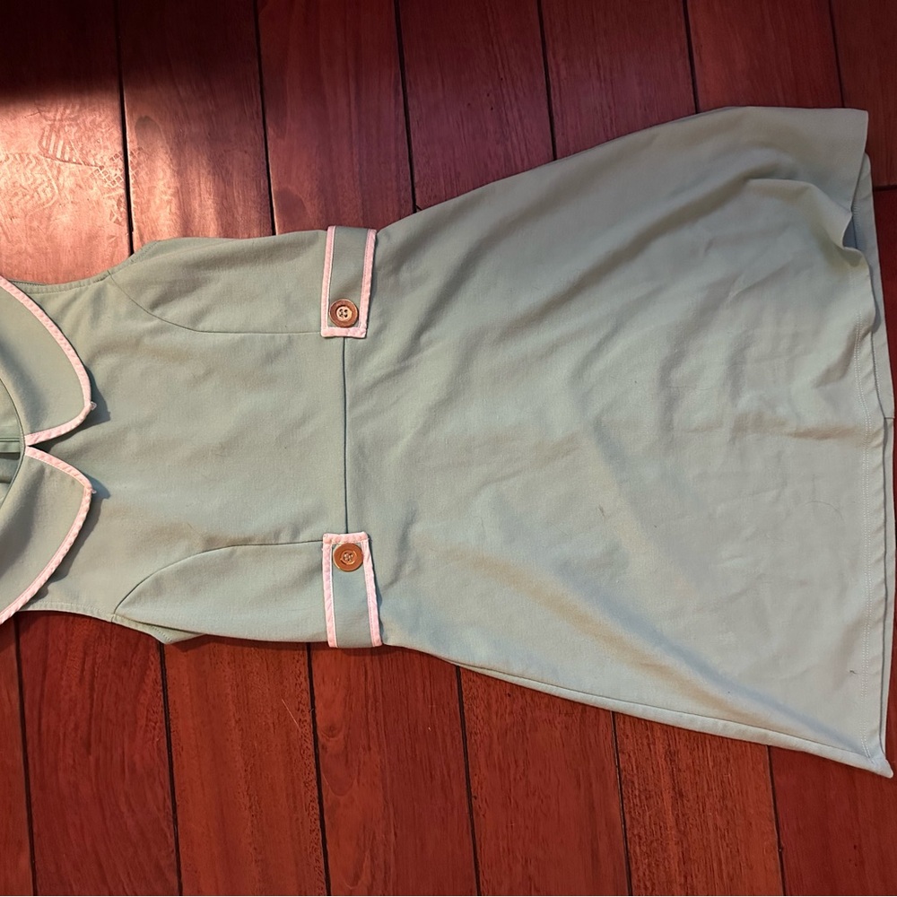 Mint Green Sleeveless Dress with White Trim